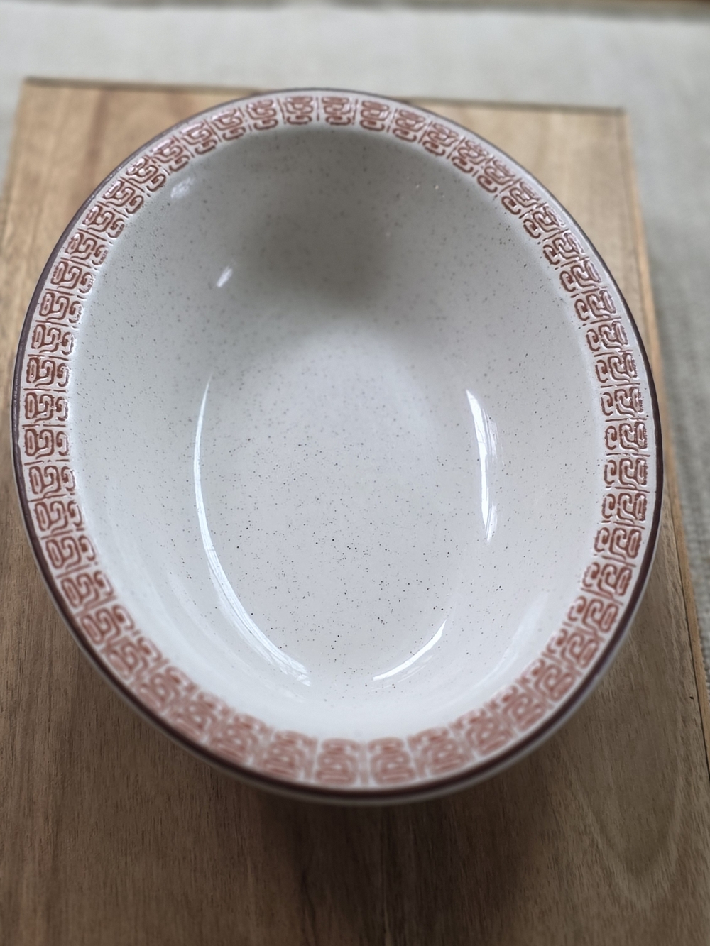 Buffalo David Bitton Speckled White Serving Bowl with Rust Geometric Border
